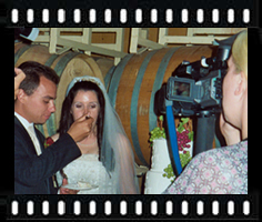 Angela filming cake cutting